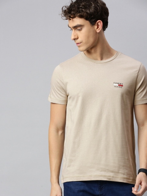 

Tommy Hilfiger Men Beige Solid Round Neck Pure Cotton T-shirt