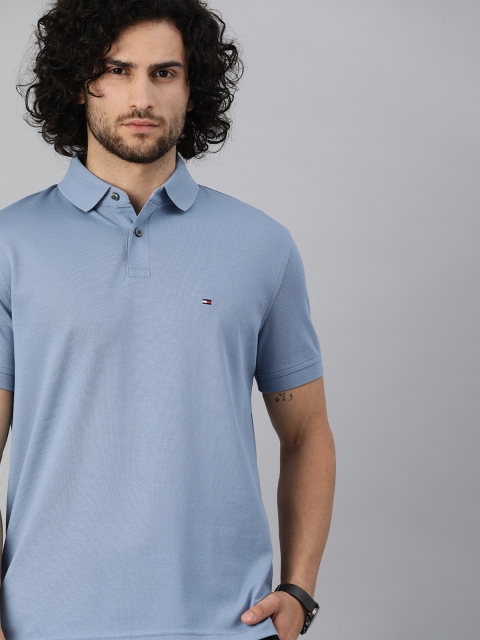 

Tommy Hilfiger Men Blue Solid Polo Collar T-shirt