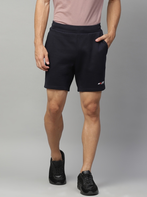 

Tommy Hilfiger Men Navy Blue Solid Regular Fit Shorts