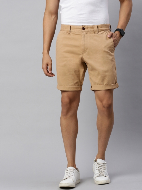 

Tommy Hilfiger Men Beige Solid Regular Fit Regular Shorts