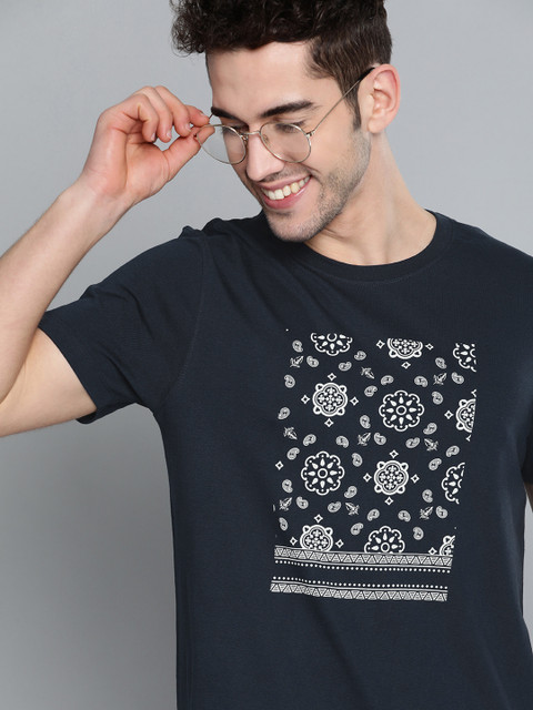 

Mast & Harbour Men Navy Blue & White Pure Cotton Ethnic Motifs Print Round Neck T-shirt