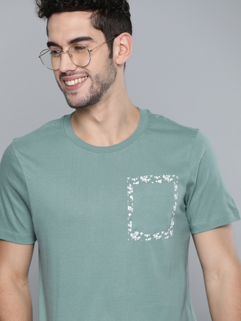 

Mast & Harbour Men Green Pure Cotton Solid Round Neck T-shirt