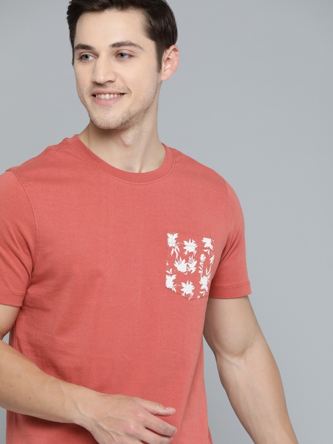 

Mast & Harbour Men Coral Pink Solid Round Neck Pure Cotton T-shirt