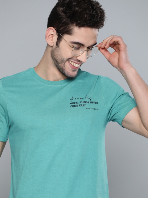 

Mast & Harbour Men Blue Pure Cotton Solid Round Neck T-shirt