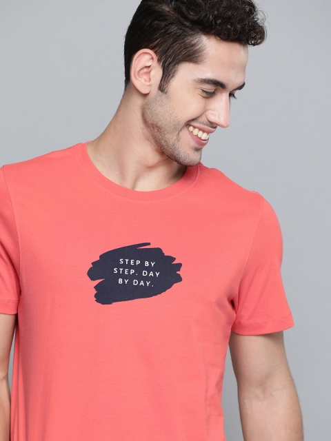 

Mast & Harbour Men Coral Pink Pure Cotton Solid Round Neck T-shirt