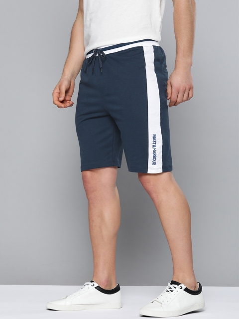 

Mast & Harbour Men Navy Blue Solid Pure Cotton Regular Shorts