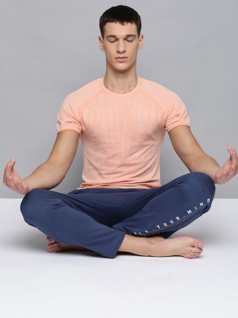 

HRX By Hrithik Roshan Men Peach Melange Solid Seamless Melange Rapid-Dry Yoga Tshirt