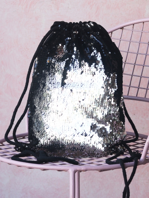 

Ayesha Women Silver-Toned & Black Flip Sequined Backpack