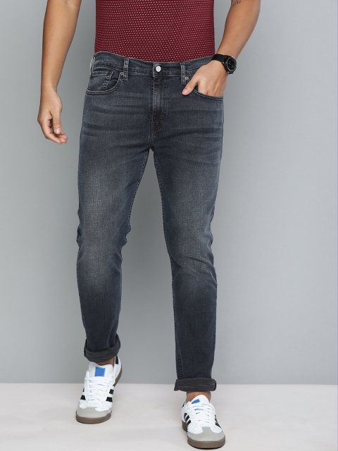 

Levis Men Blue Tapered Fit Mid-Rise Clean Look Jeans