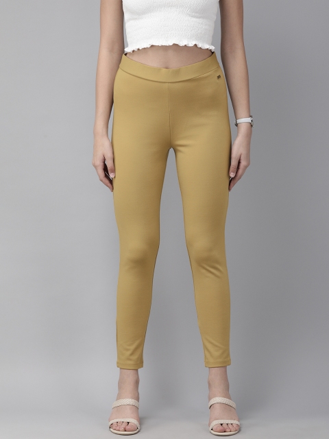 

Park Avenue Women Beige Solid Jeggings