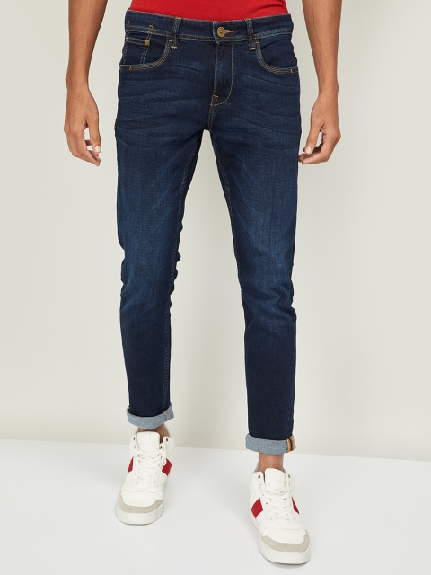 

Forca Men Blue Tapered Fit Mid-Rise Clean Look Jeans
