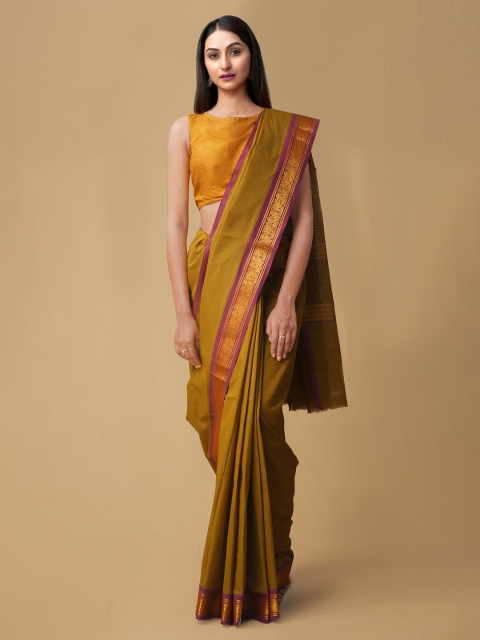 

Unnati Silks Olive Green & Rust Orange Pure Cotton Solid Handloom Kanjeevaram Saree