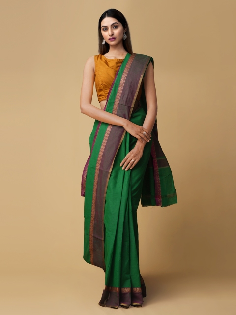 

Unnati Silks Green Pure Cotton Solid Kanjeevaram Saree
