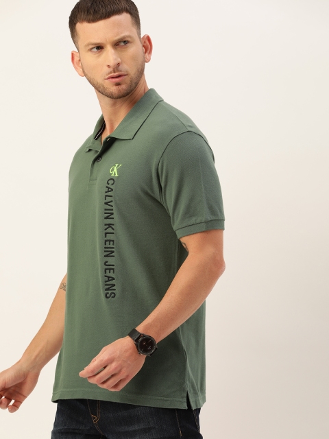 

Calvin Klein Jeans Men Green Solid Polo Collar T-shirt with Logo Detailing