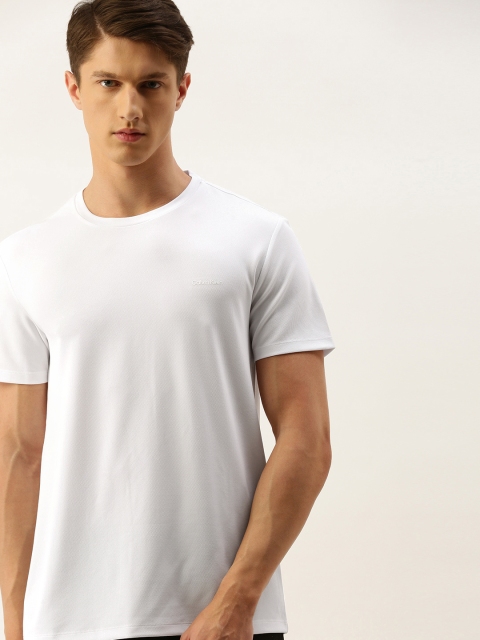 

Calvin Klein Jeans Men White Solid Round Neck T-shirt