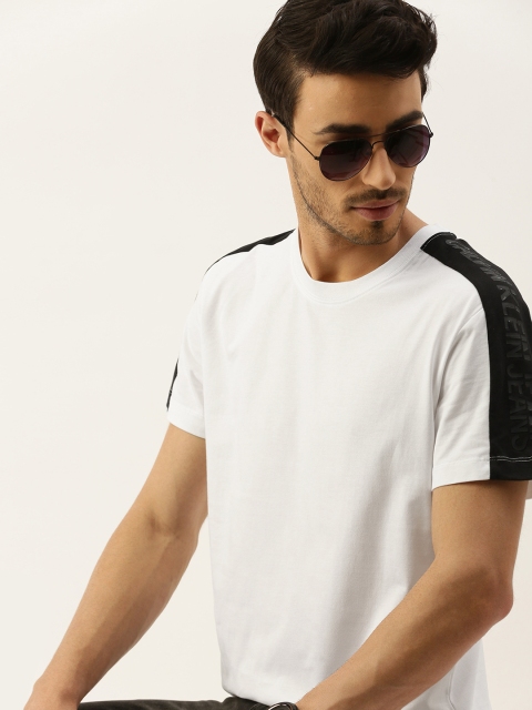

Calvin Klein Jeans Men White Solid Round Neck T-shirt