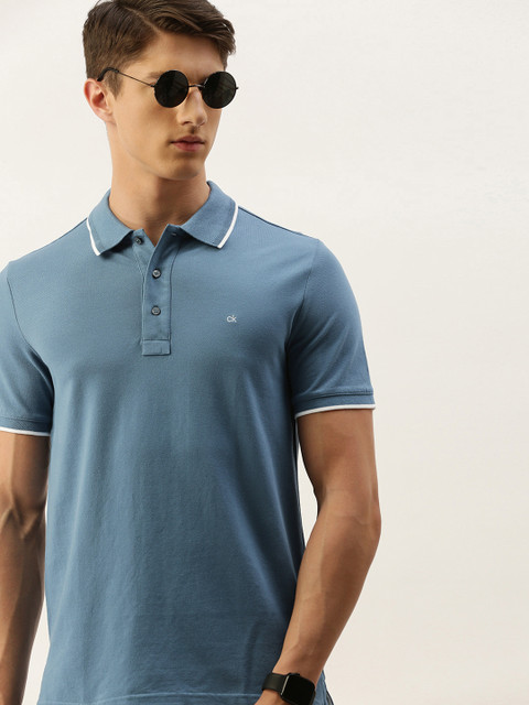 

Calvin Klein Jeans Men Teal Blue Solid Slim Fit Polo Collar T-shirt