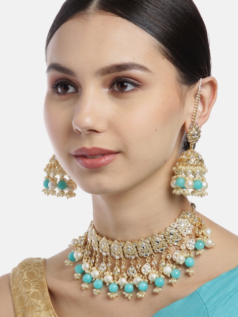 

Melani Borsa Turquoise Blue & Off-White Gold-Plated Kundan Studded & Beaded Jewellery Set
