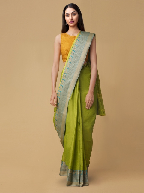 

Unnati Silks Green Pure Cotton Solid Kanjeevaram Saree