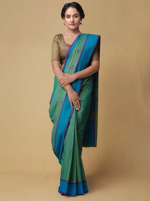 

Unnati Silks Green Pure Cotton Solid Kanjeevaram Saree