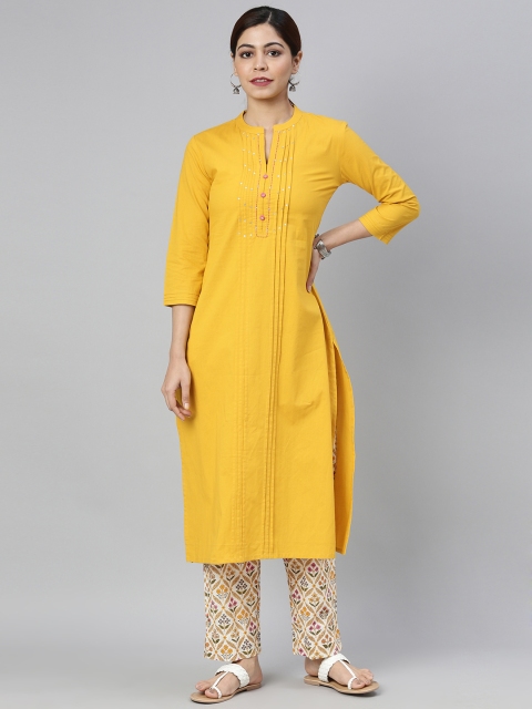 

AHIKA Women Yellow & Beige Solid Kurta with Trousers
