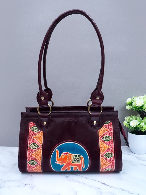 

Golden Peacock Burgundy & Blue Printed Handheld Bag