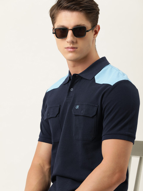 

Calvin Klein Jeans Men Navy Blue Solid Polo Collar T-shirt With Colourblocked Detailing