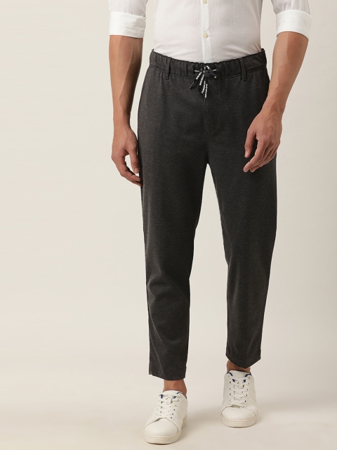 

Calvin Klein Jeans Men Charcoal Grey Regular Fit Solid Regular Trousers