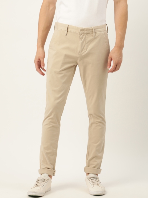 

Calvin Klein Jeans Men Beige Regular Fit Solid Chinos