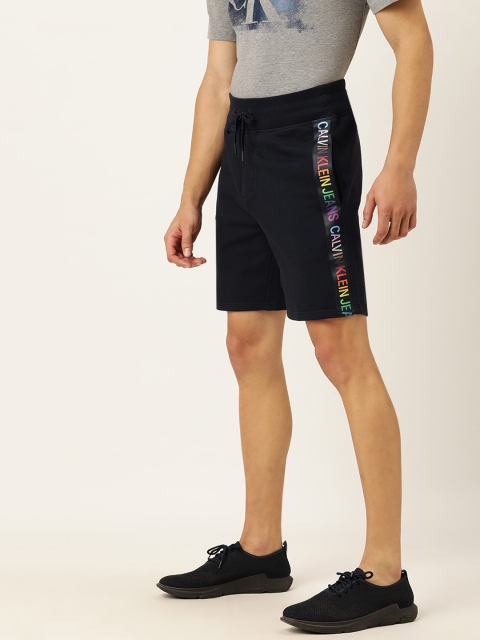 

Calvin Klein Jeans Men Black Solid Regular Fit Regular Shorts with Taping Detail