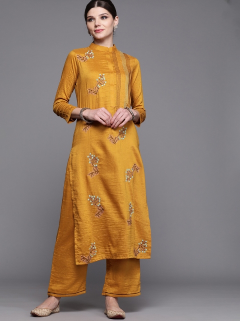 

Inddus Women Mustard Yellow Floral Embroidered Kurta with Palazzos