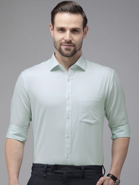 

Park Avenue Men Green Slim Fit Solid Smart Casual Shirt