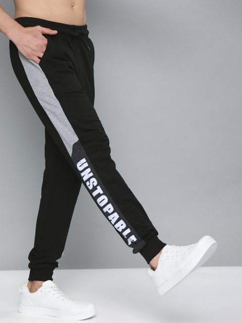 

HERE&NOW Men Black Solid Joggers with Side Taping Detail