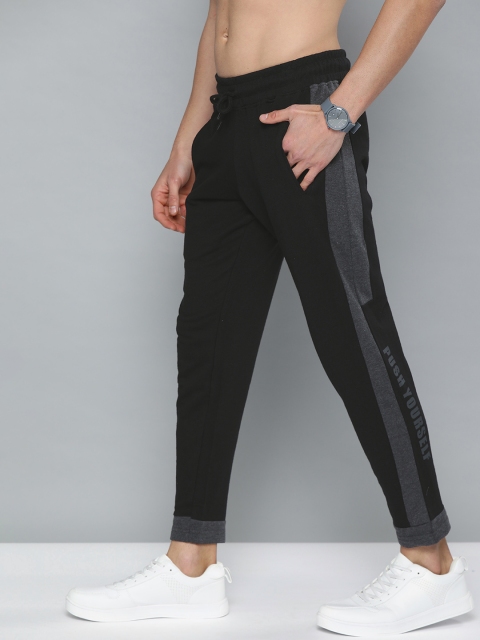 

HERE&NOW Men Black Solid Joggers with Side Taping Detail