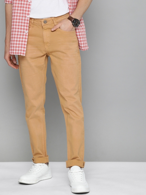 

Mast & Harbour Men Beige Tapered Fit Mid-Rise Clean Look Jeans