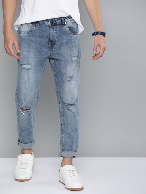 

Mast & Harbour Men Blue Carrot Fit Mid-Rise Mildly Distressed Stretchable Jeans