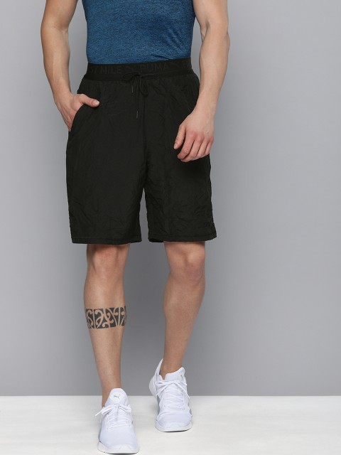 

Puma Men Black Solid Train First Mile 9 Sustainable Sports Shorts with Crushed Effect