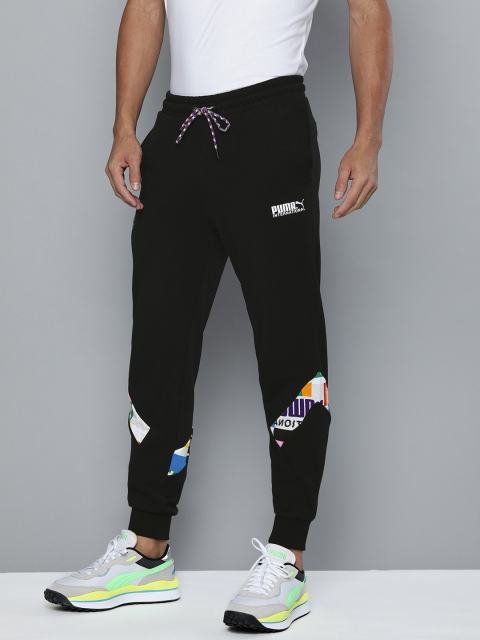 

Puma INTL Black Solid Pants Joggers With Over roller Print panel
