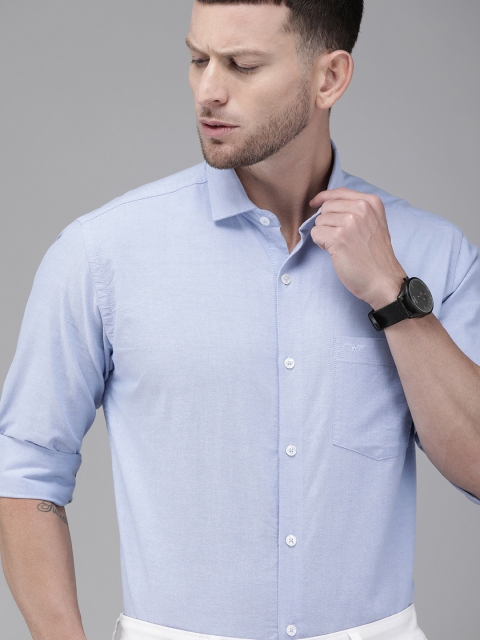 

Park Avenue Men Blue Slim Fit Solid Casual Shirt