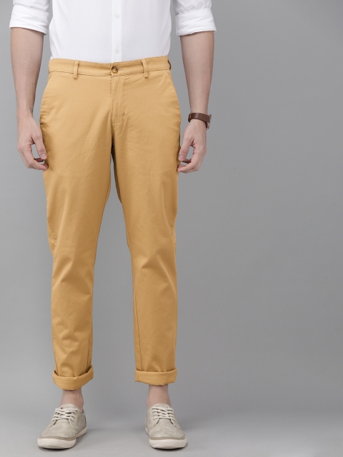 

Park Avenue Men Khaki Brown Neo Fit Solid Regular Trousers