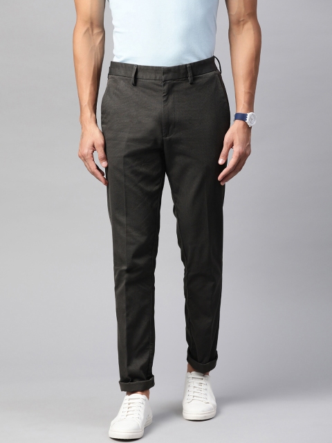 

Marks & Spencer Men Teal Blue & Beige Slim Fit Self Design Regular Trousers