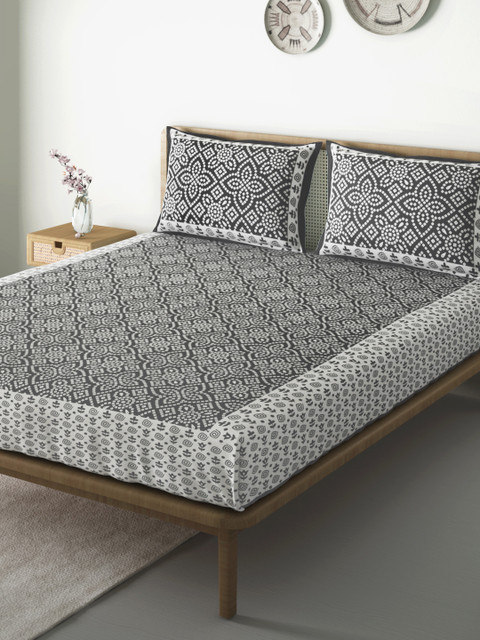 

Aura Black & White Geometric 104 TC Cotton 1 Queen Bedsheet with 2 Pillow Covers