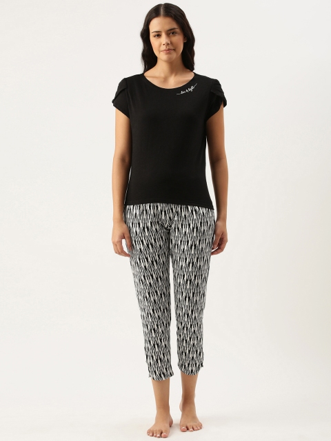 

Enamor Women Black & White Relaxed Fit Solid Night Suit