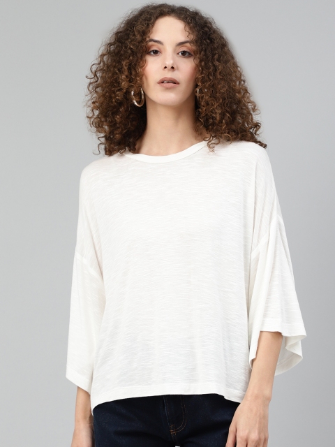 

Femella Women White Solid Round Neck T-shirt