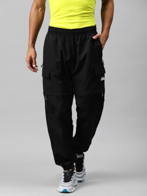 

ADIDAS Originals Men Black Solid UTLTY 2 In 1 Joggers & Shorts
