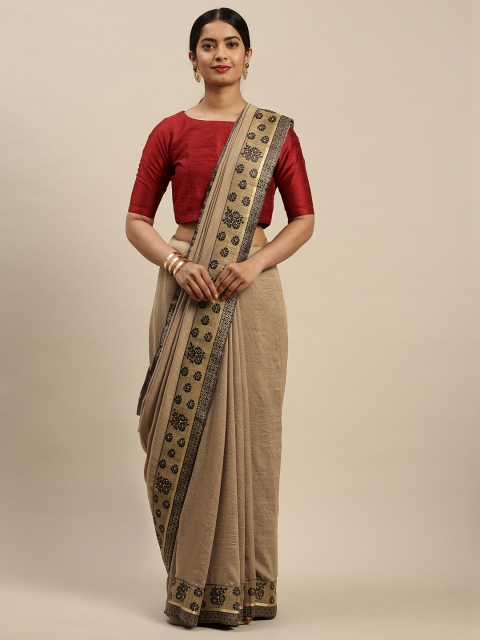 

Indian Women Brown Solid Saree