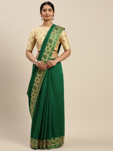 

Indian Women Green Solid Saree