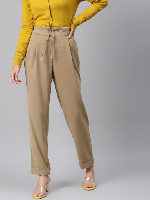 

Marks & Spencer Women Beige Tapered Fit Solid Peg Trousers