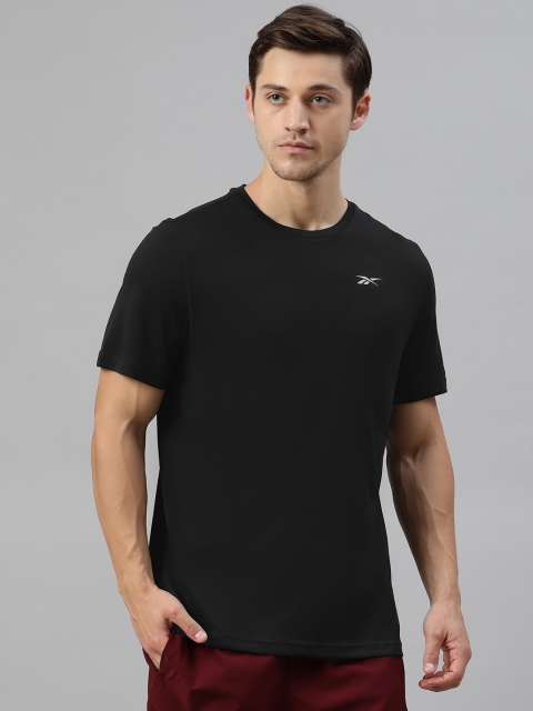 

Reebok Men Black Solid Round Neck T-shirt