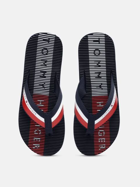 

Tommy Hilfiger Men Navy Blue & Red Striped Thong Flip-Flops